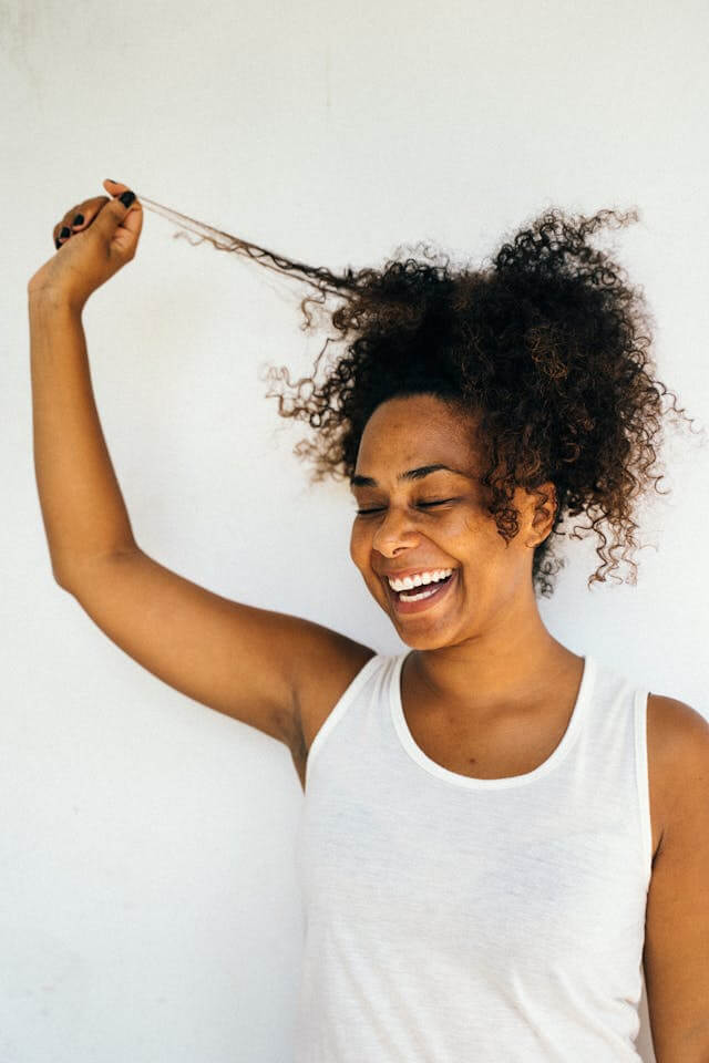 A woman smiling