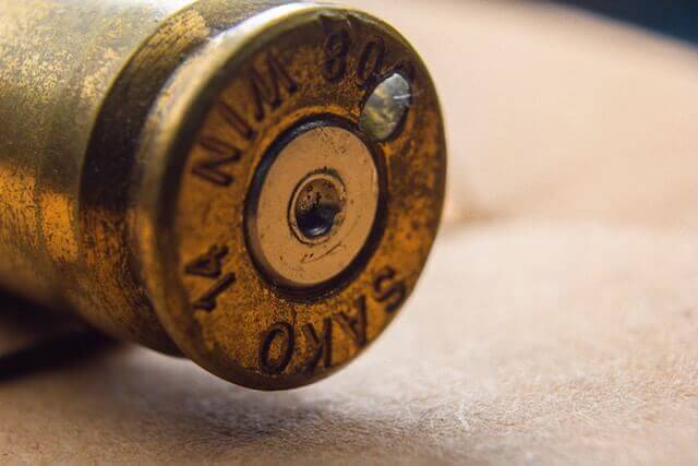A bullet laying on the ground