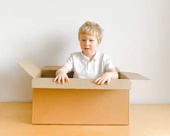 A dad holding his children