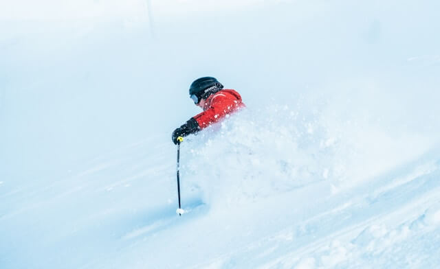 A man skiing in the snow
